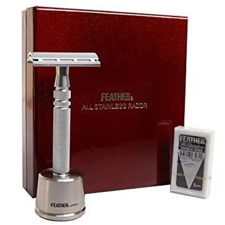 Feather AS-D2 all-stainless safety razor on its stand in a gift box